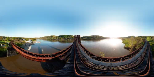 The railroad bridge in Aspinwall during a spring sunset.
